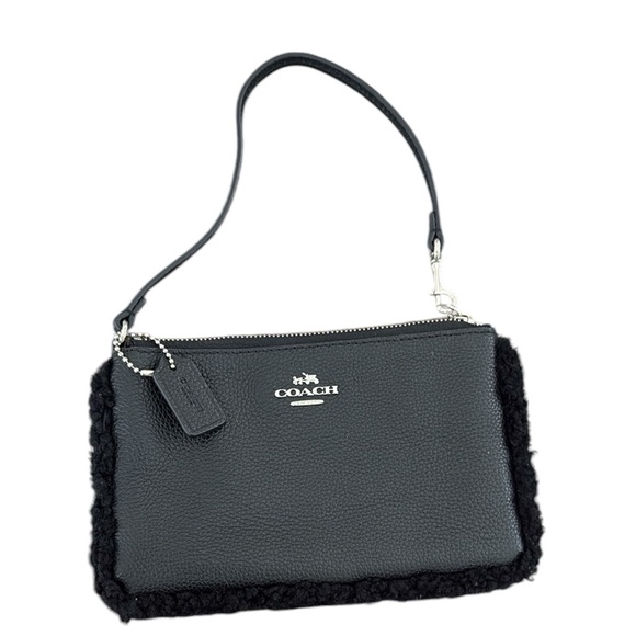 Coach Handbags - Coach Wristlet Black Pebbled Leather W/ Black Shearling Trim F64709